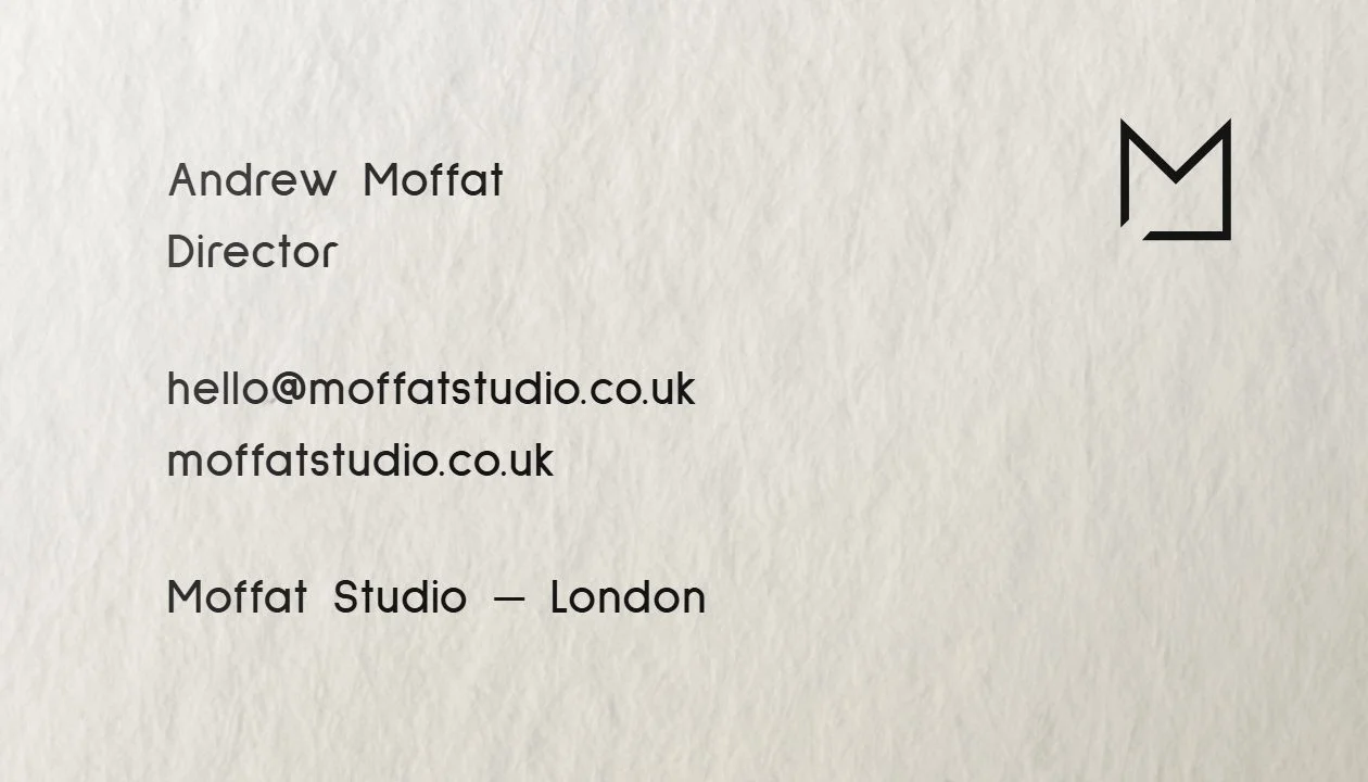 Moffat Studio business card — back, with Andrew Moffat's contact details and the M mark