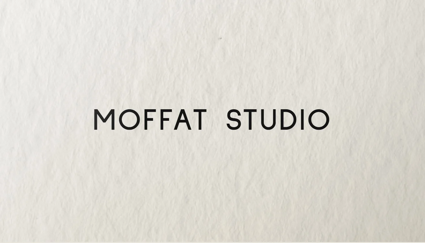 Moffat Studio business card — front, with the studio wordmark on felt-marked paper stock